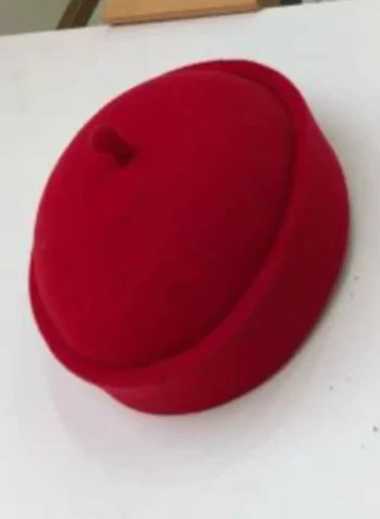 A Red Wool African Ibo Traditional Hat