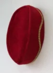 A Red and gold lines ceremonial African Traditional hat