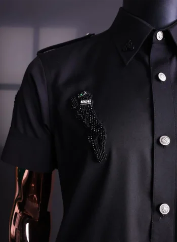 A Charcoal black, button African traditional senator kaftan native.