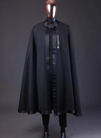 A charcoal black, connected square embroidery design with matching gold and red Swarovski stone details agbada
